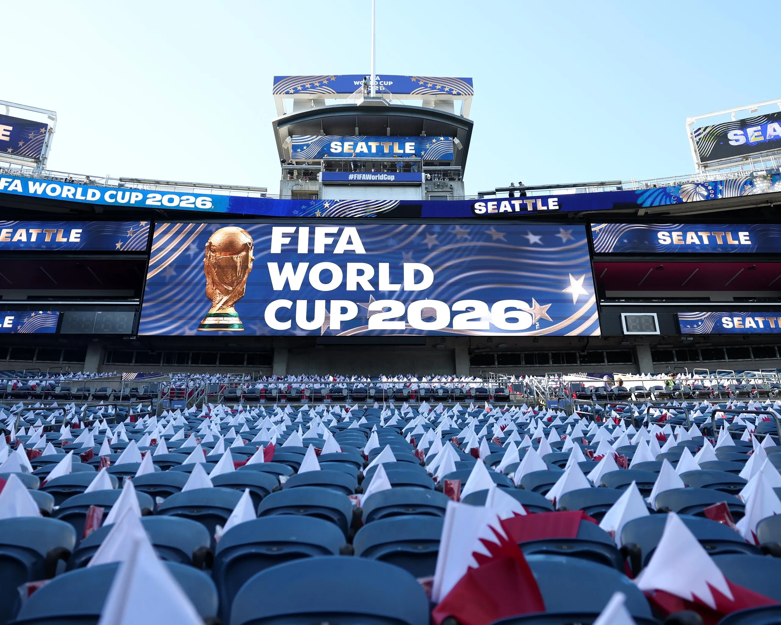 Flags have been placed on seats inside the groud.