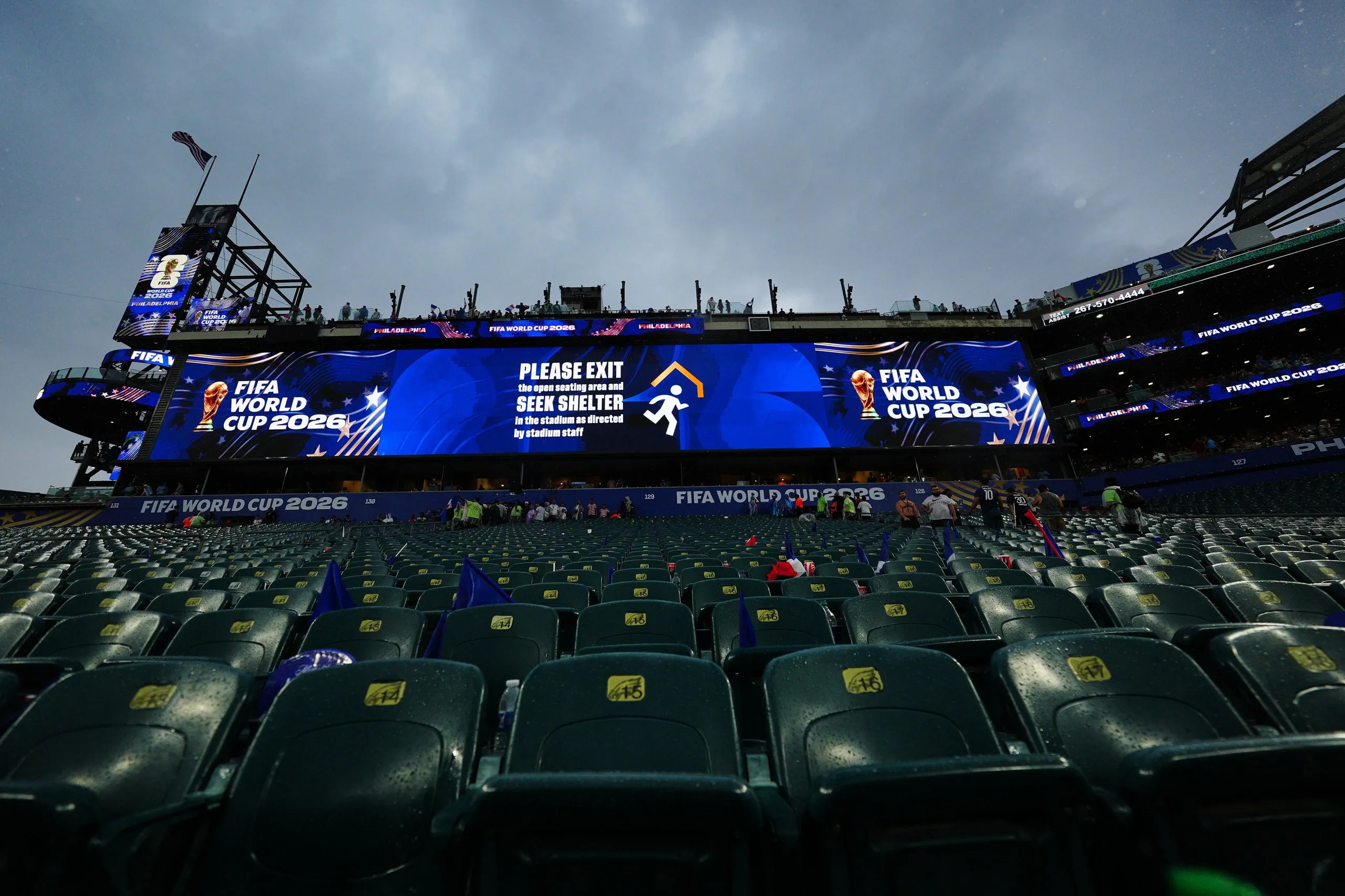 Vacant stand is seen during a storm during the World Cup Group I soccer match between France and Iraq