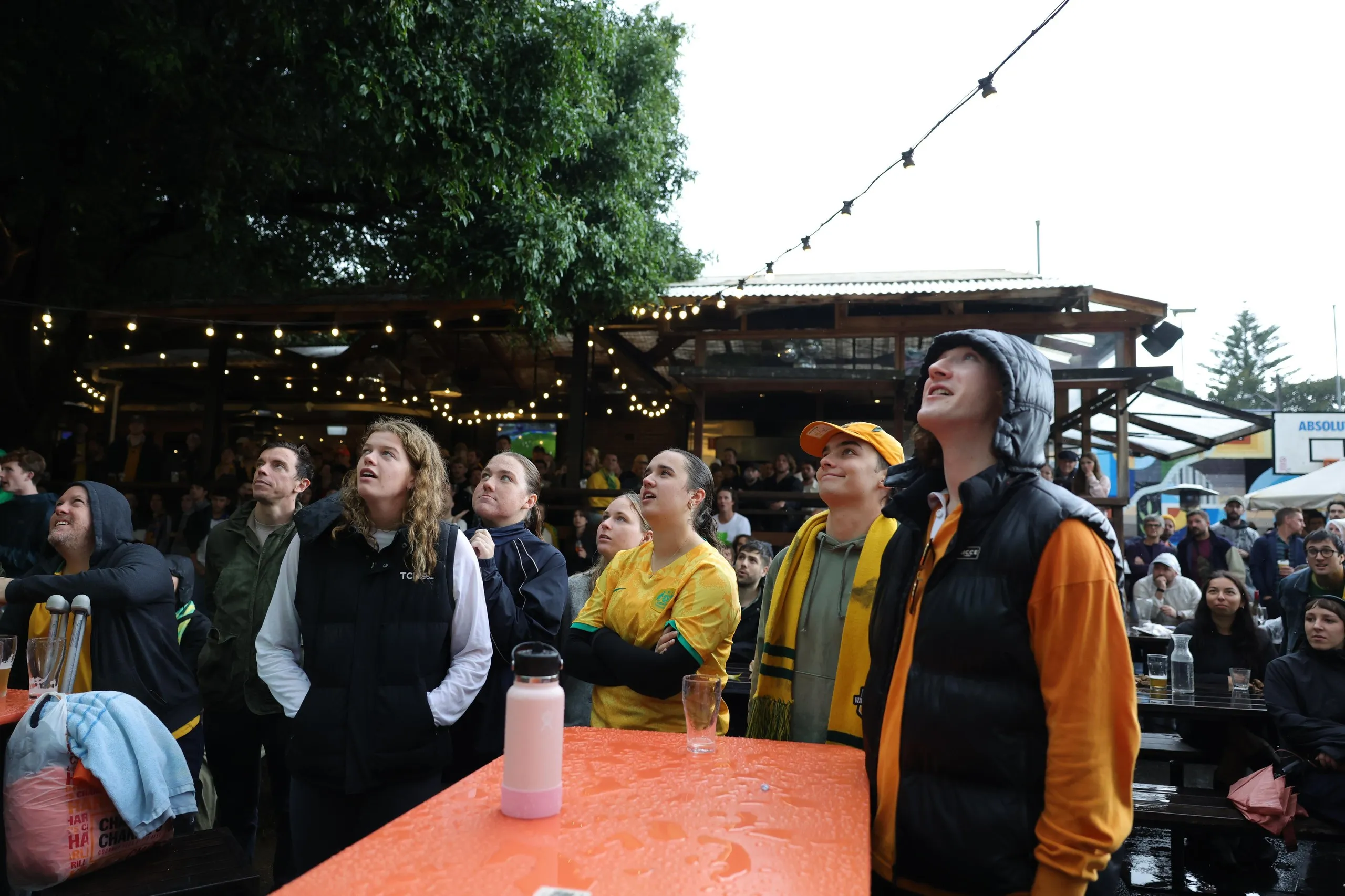 Socceroos fans watch on in Sydney’s inner west.