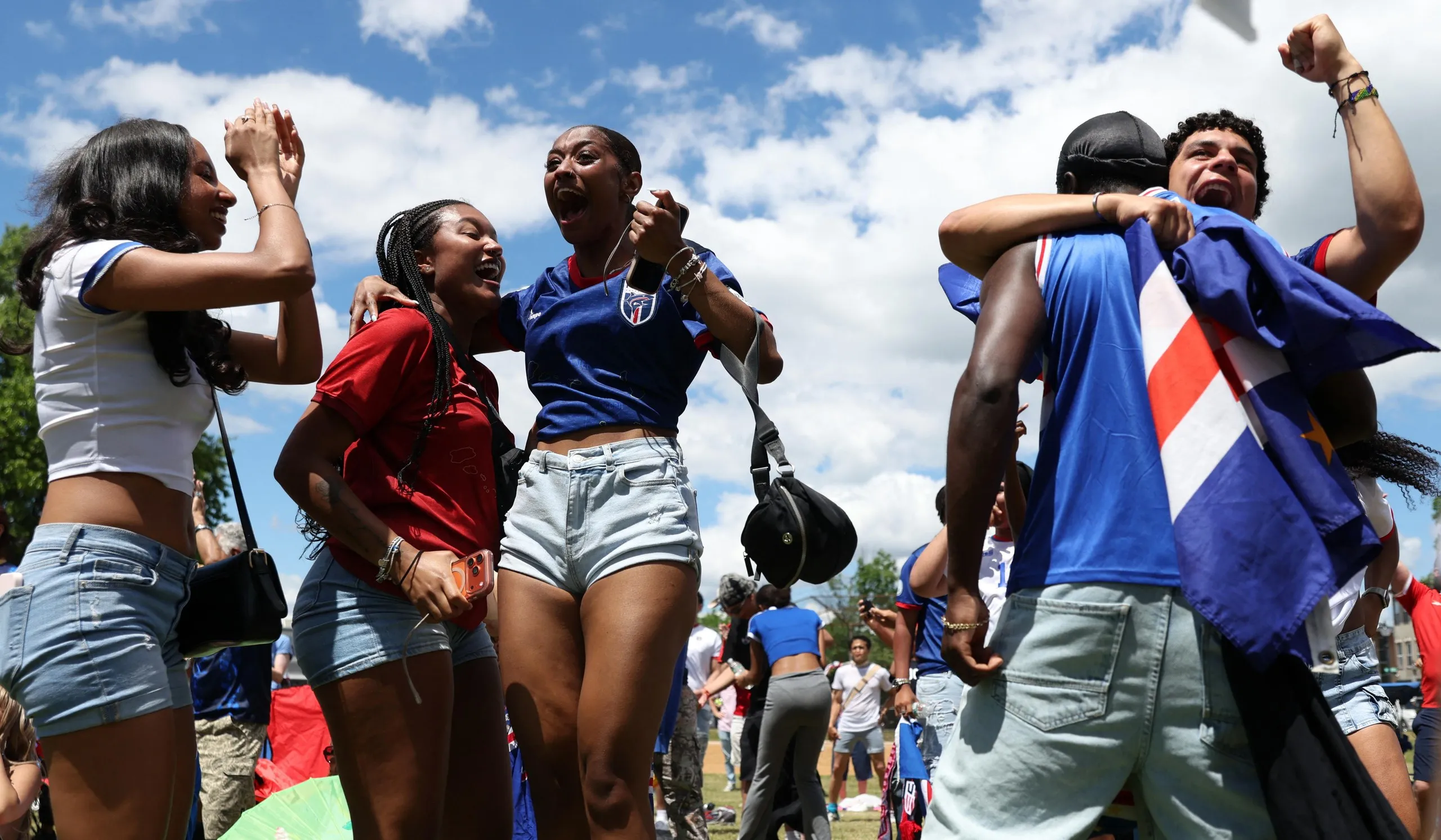 Cape Verde fans show their delight after the match against Spain in Town Field Park in Boston.