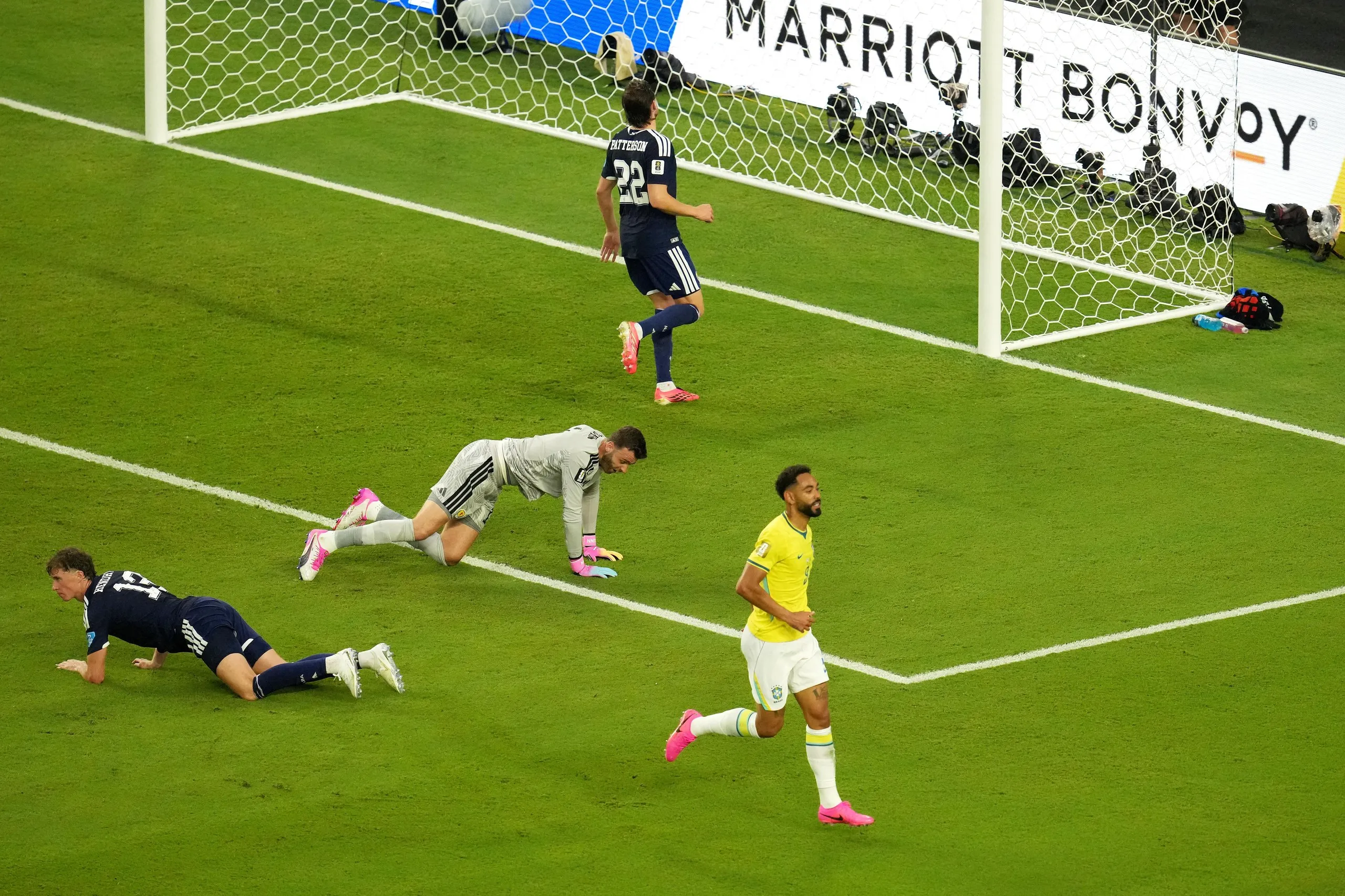 Brazil’s Matheus Cunha (right) celebrates after scoring Brazil’s third