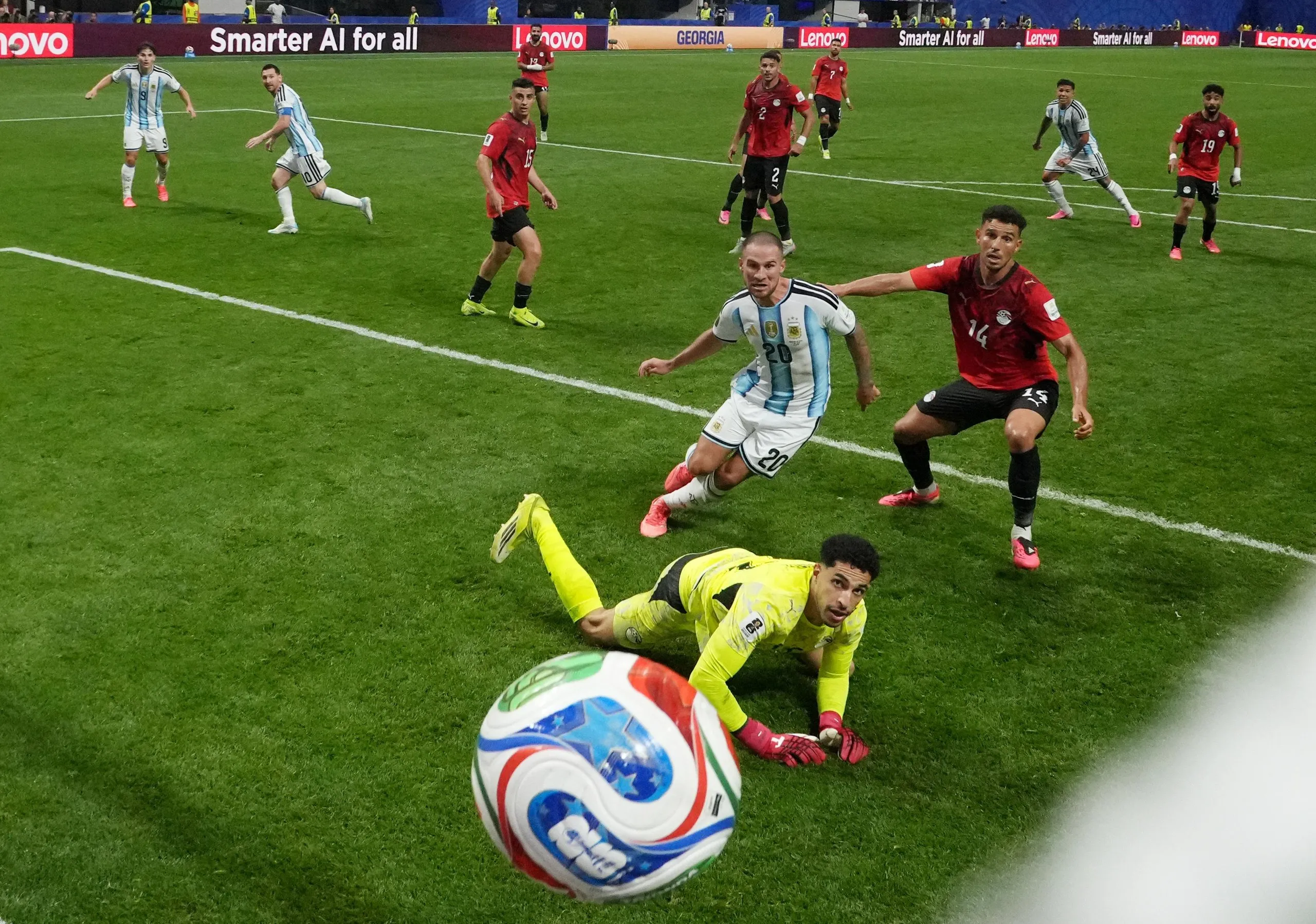 Lionel Messi (second left) fires a shot past Egypt’s keeper Mostafa Shobeir for Argentina’s equaliser in their 3-2 win.