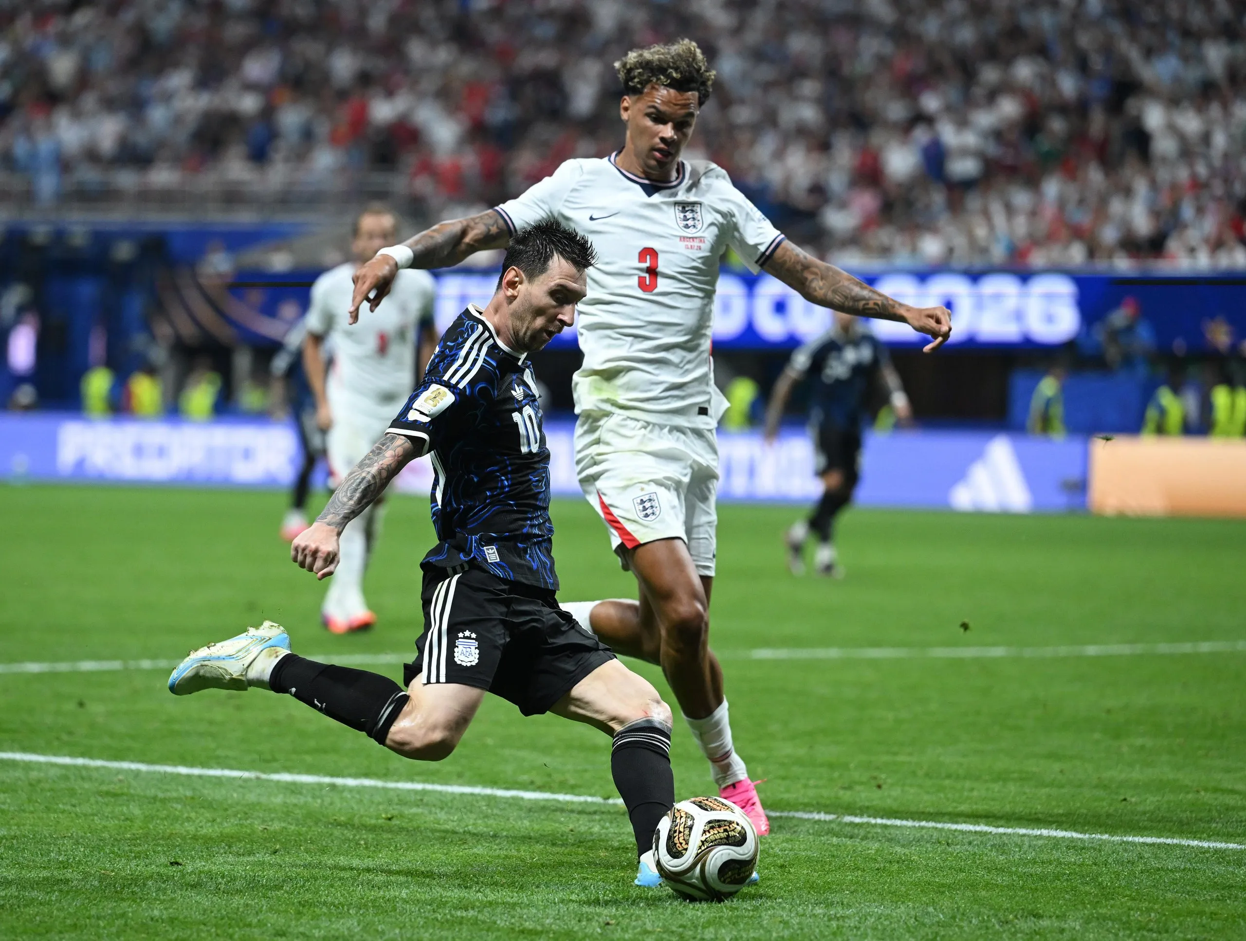 Lionel Messi puts in the cross for Argentina’s winner against England