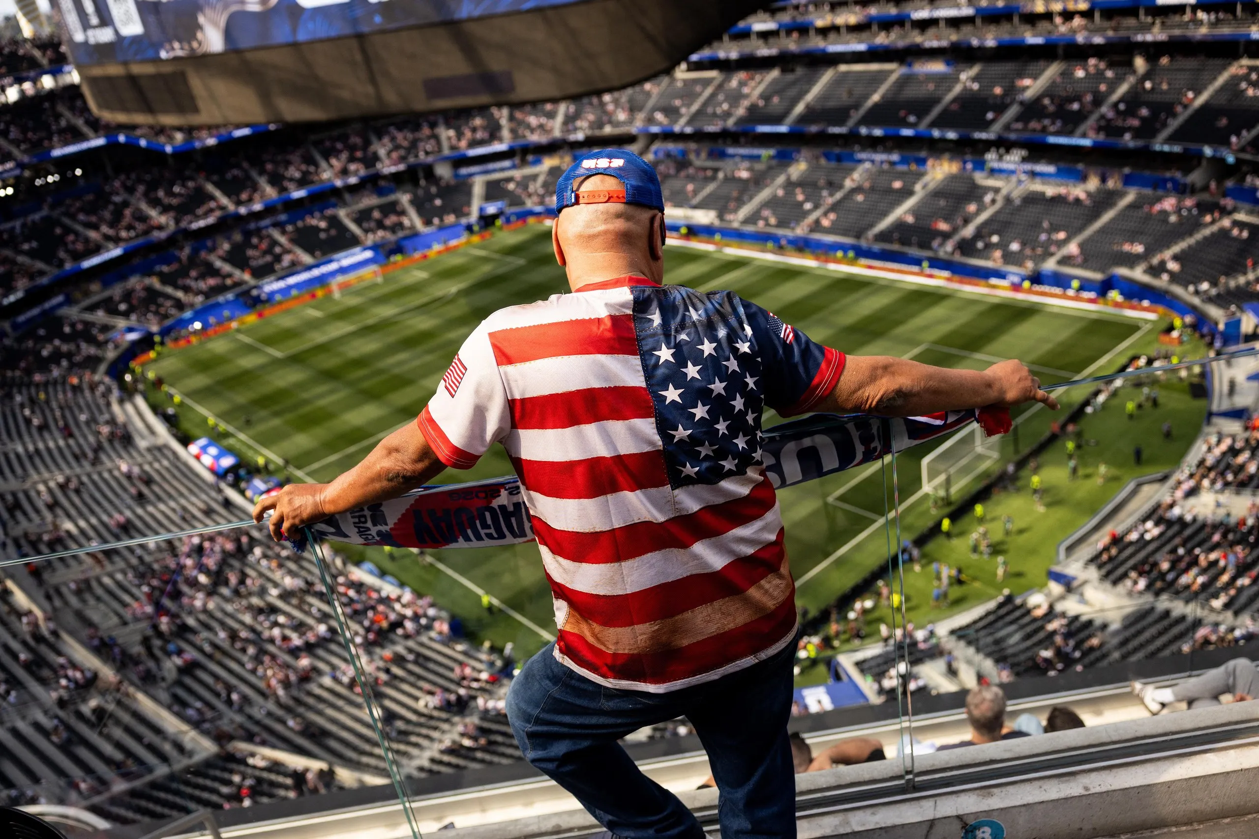 a man looking out a stadium