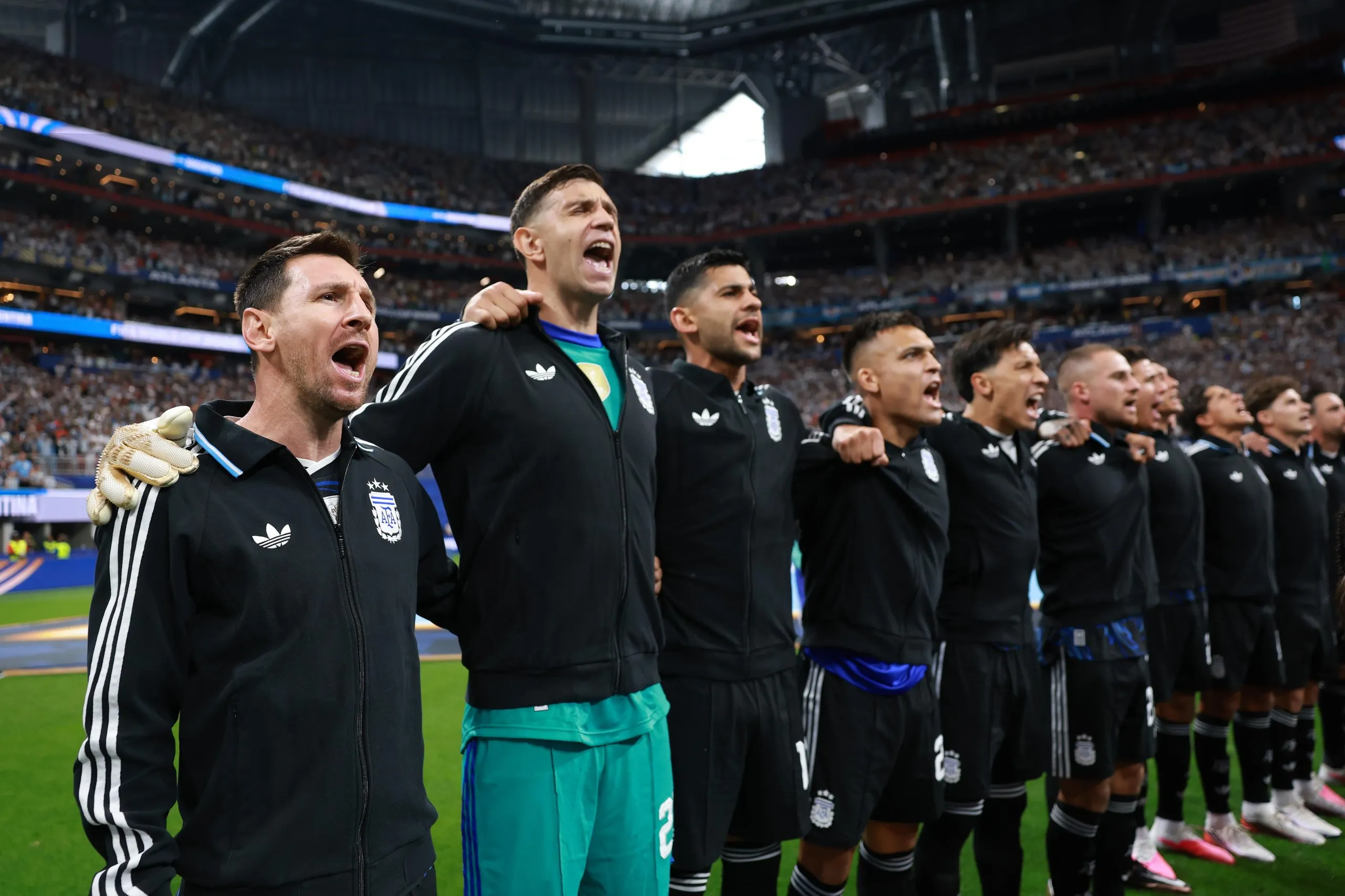 Argentina’s players belt out the national anthem before their semi-final against England