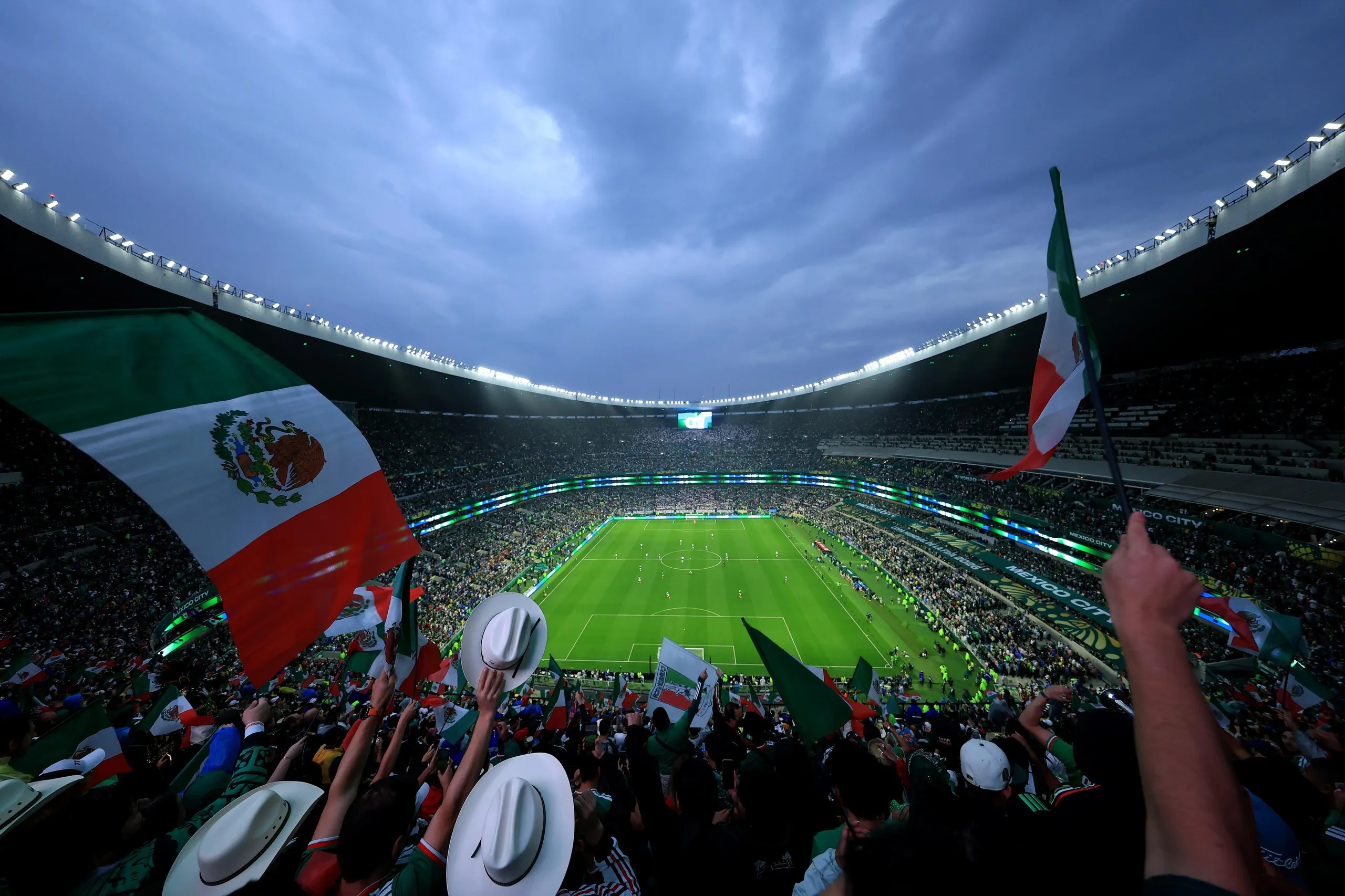 Mexico’s fans show their support for the team inside the stadium