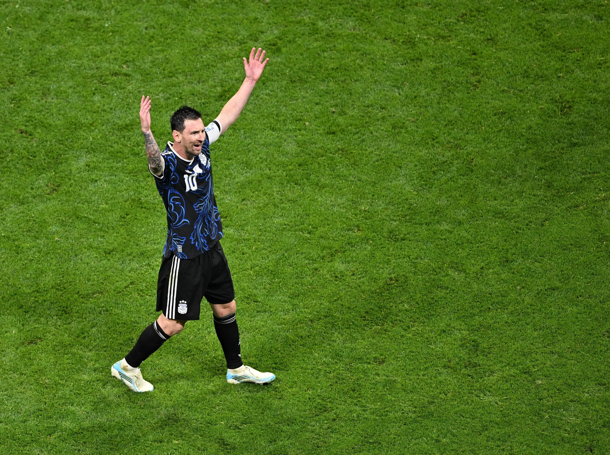 Lionel Messi celebrates after the win