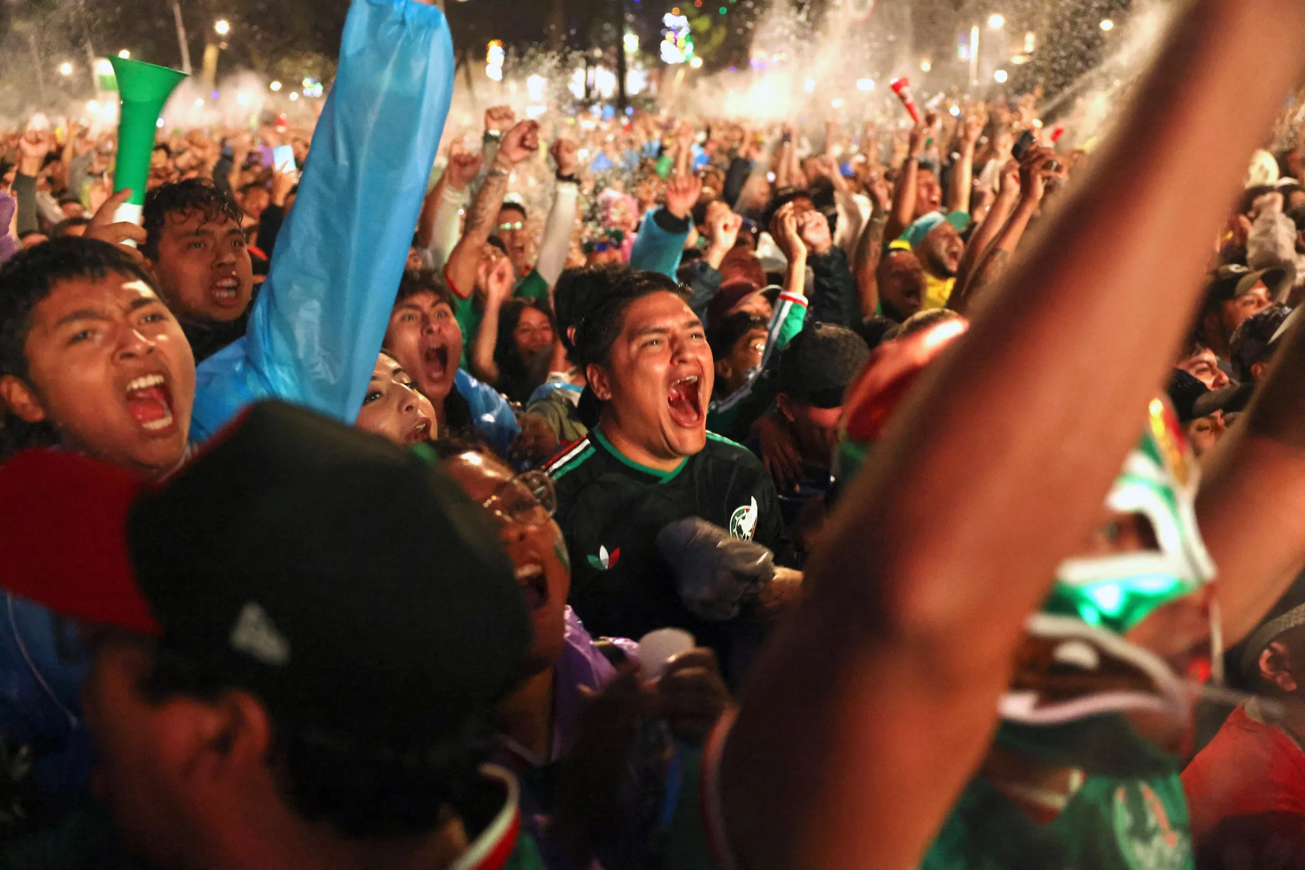 Mexican football watch their game against England.